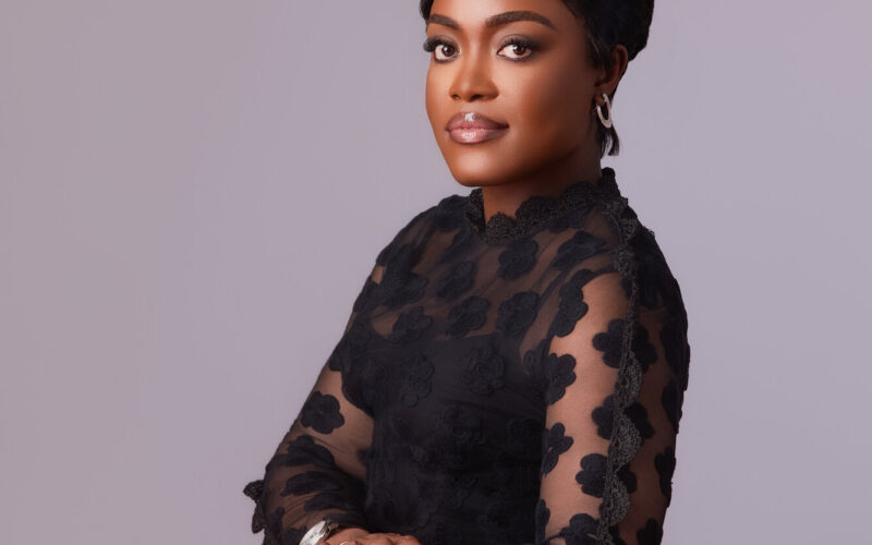 Dr. Adaeze Oreh — Professional portrait in black lace blouse