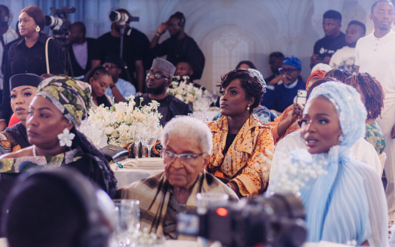 Dr. Adaeze Oreh seated among guests at a formal ceremony